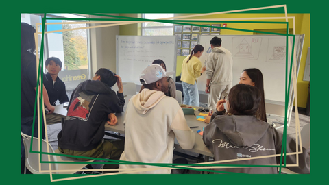 Group of students in class talking to each other