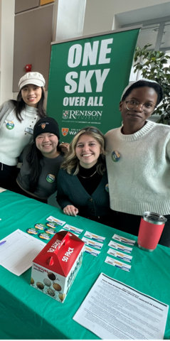Students at a Renison booth