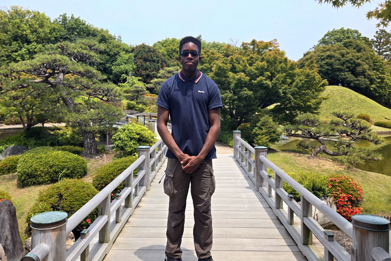 student in japanese garden 
