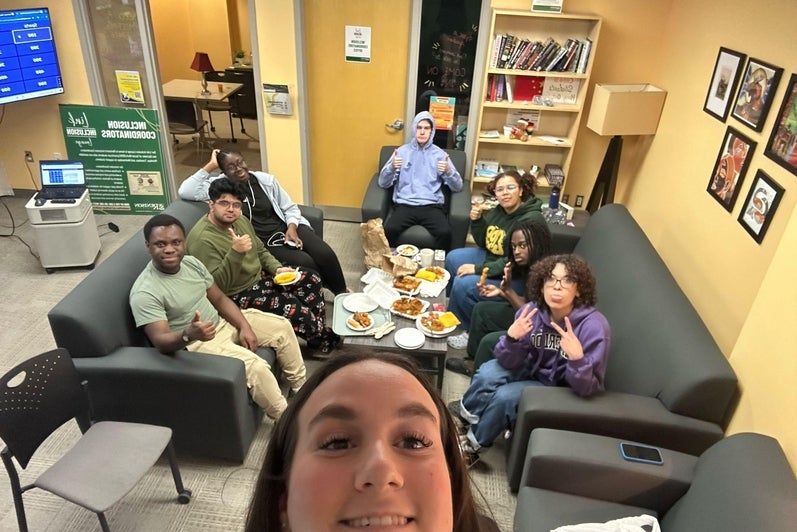 Students hanging in the Link Inclusion Lounge
