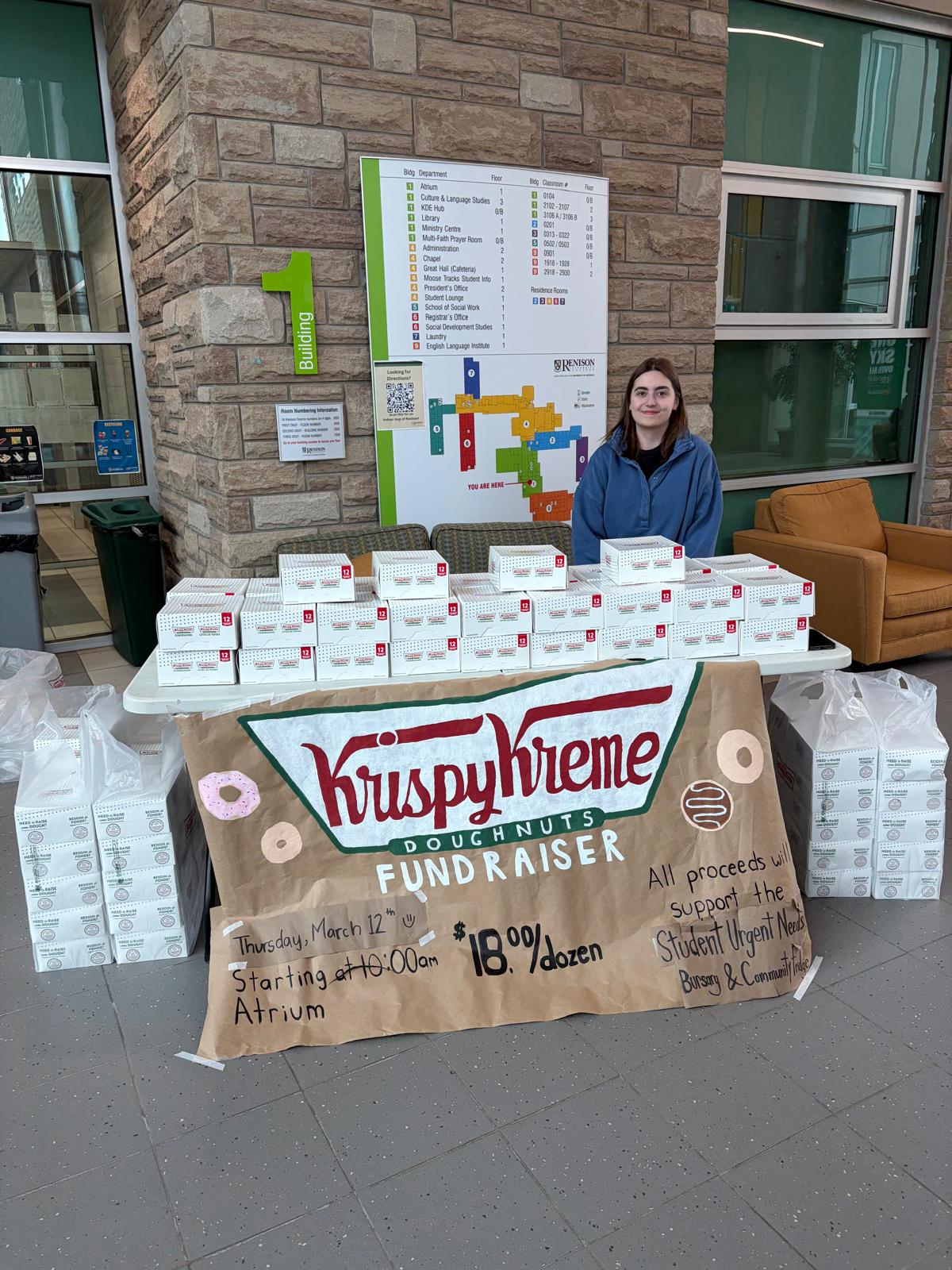 Megan at Krispy Kreme fundraiser table