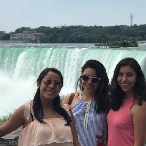 Three students standing in front of Niagara Falls