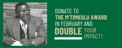 Dr. Donald M'Timkulu sitting at his desk in the 1970s. Text reads: donate to the M'Timkulu Award in February and double your impact. 