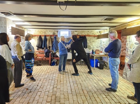 Amir Al-Azraki doing a scene with forum theatre participants