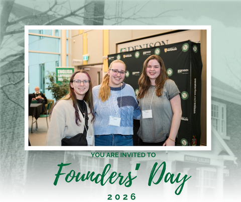 Three students at last years Founder's Day event smiling at camera