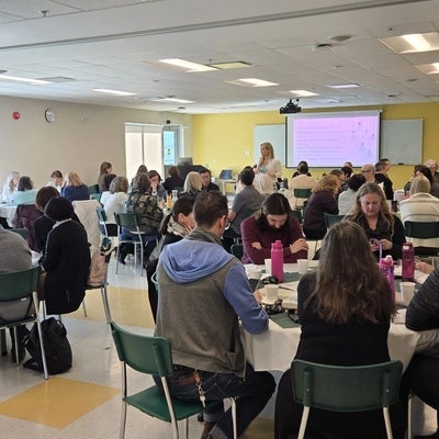 Dr. Jessica Riddell speaking to Renison staff and faculty 