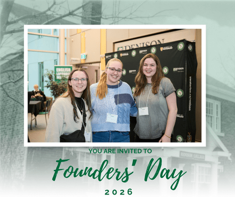 Three students at last years Founder's Day event smiling at camera
