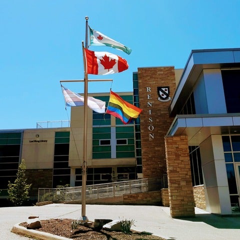 Renison entrance with flags