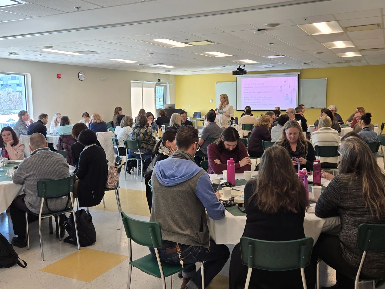 Dr. Jessica Riddell speaking to Renison staff and faculty 