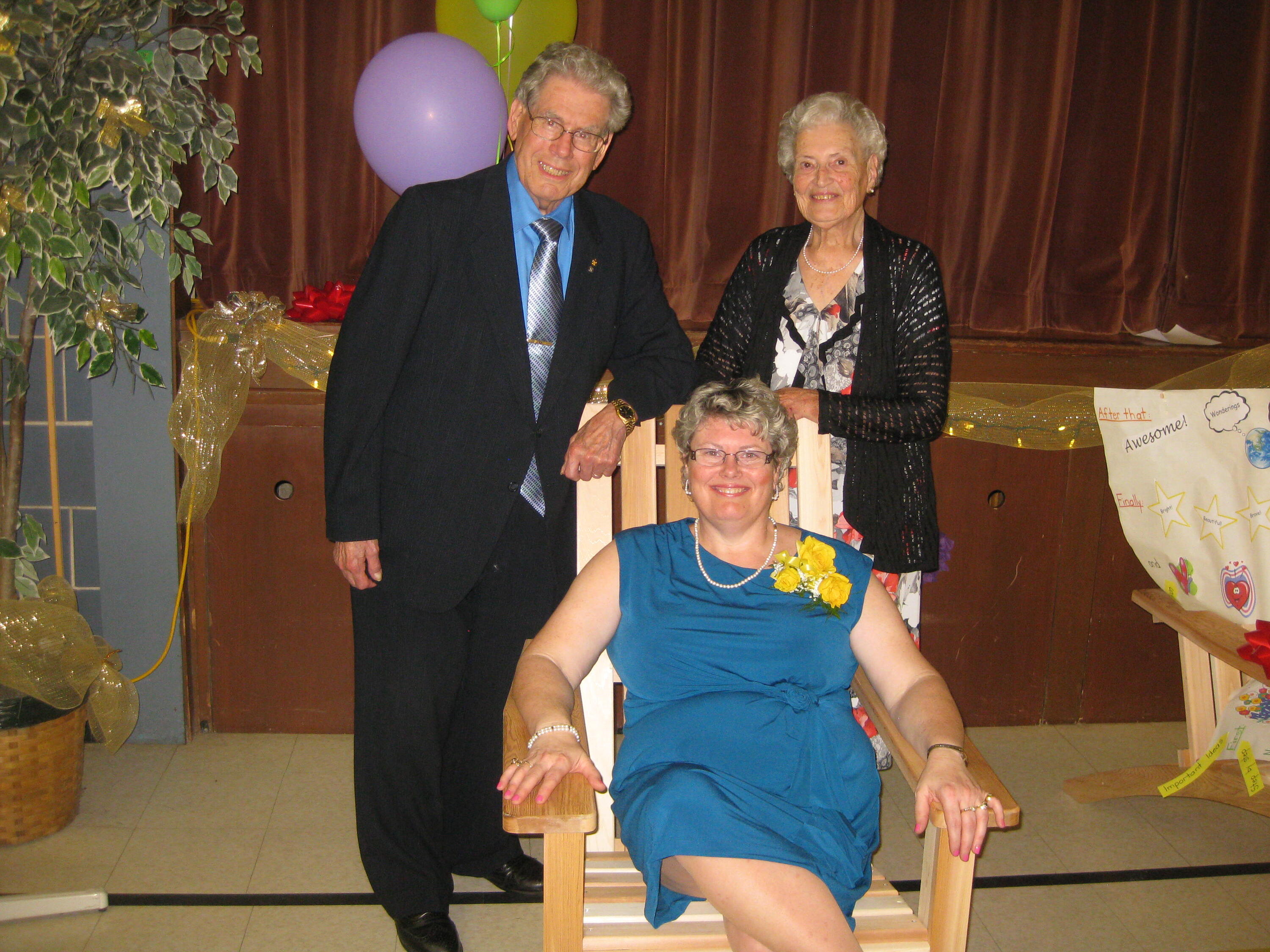 Joy and her husband, Bruce, celebrate their daughter Alison's retirement.