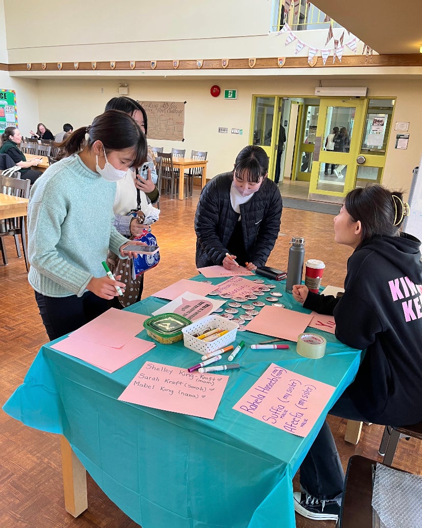 Students participating in activities in the great hall. 
