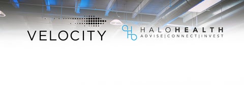 Photo of indoor space with text, 'Velocity' and 'Halo Health'