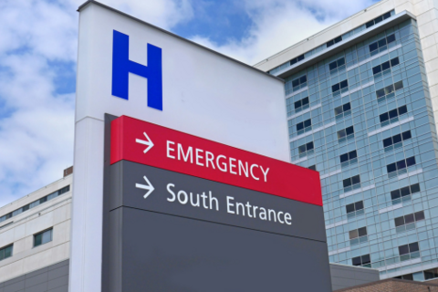 Directional sign outside a hospital