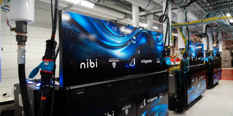 Nibi and University of Waterloo signage on computer unit