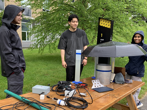 RISE students setting up the stormwater hydrology instrumentation. 