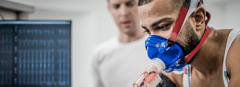 Male athlete taking a cardiopulmonary stress test.