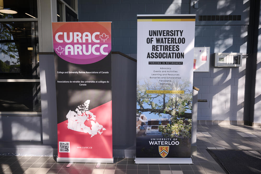 University of Waterloo Retiree Association and CURAC banners at Fed Hall.