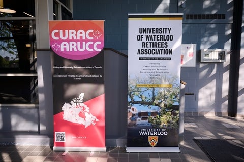 University of Waterloo Retiree Association and CURAC banners at Fed Hall.