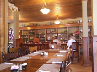 The dining table is set inside the cafe.