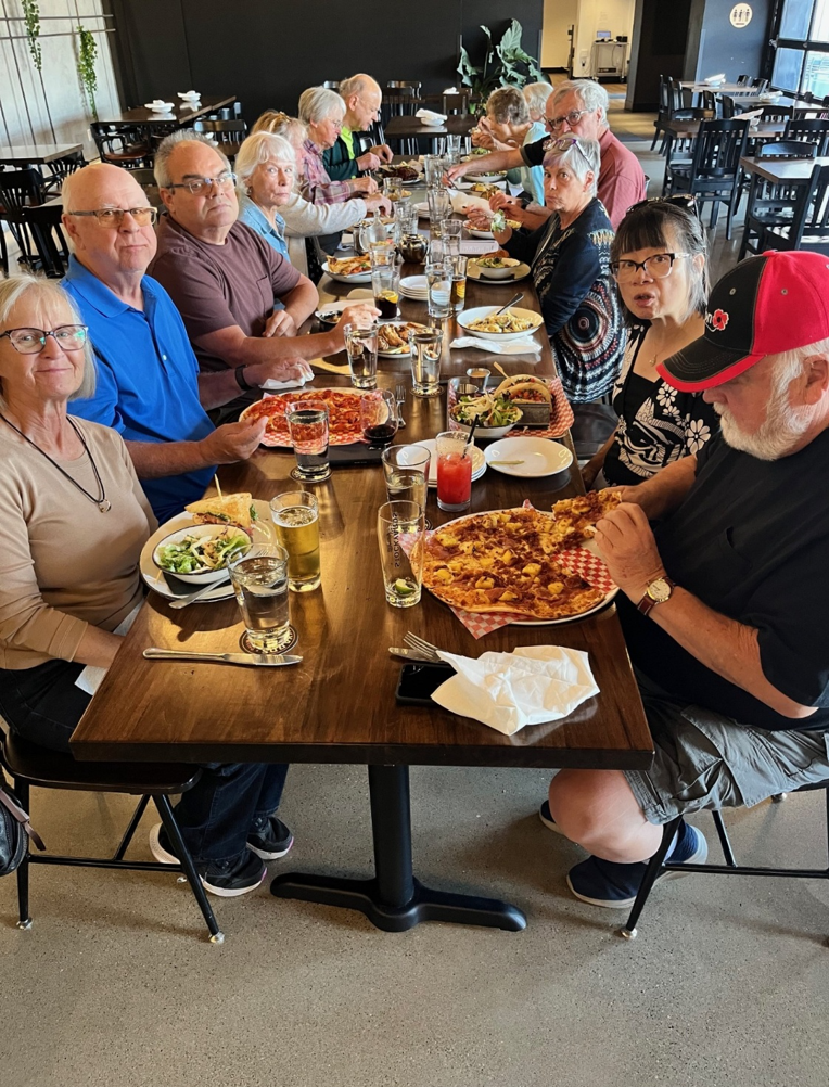 Retirees enjoying a drop-in lunch at Waterloo's Stockyard Brewery.