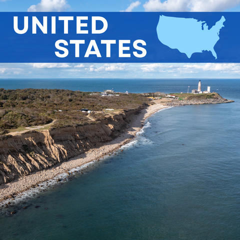 A coastline with landforms and ocean with text 'United States" and an outline of the USA
