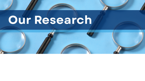 Magnifying glasses with text "Our Research"