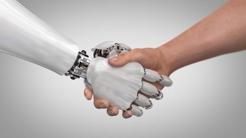 robot hand shaking a human hand