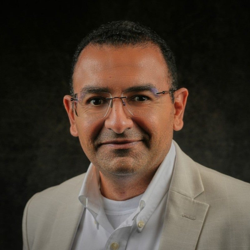 Headshot of George Shaker