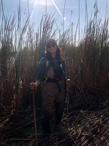 Grace Lew-Kowal in the marsh