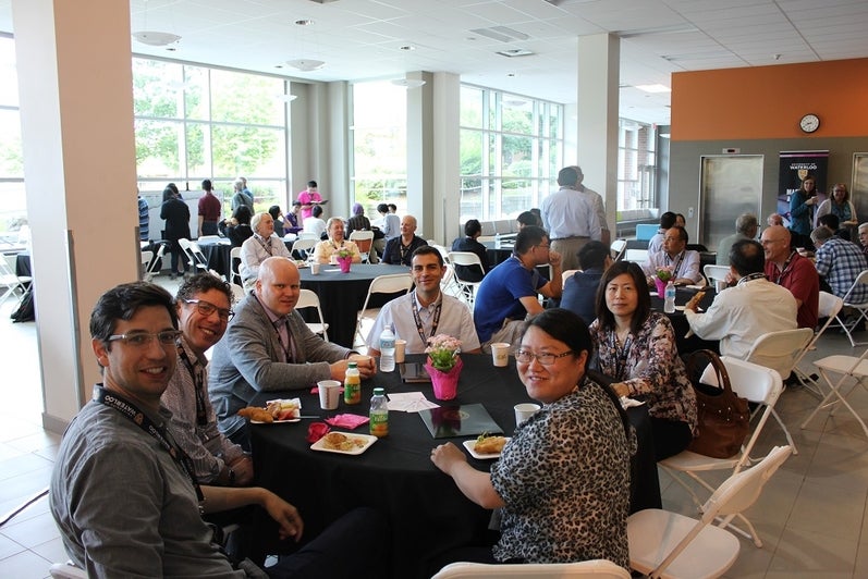 another group gathered at a table