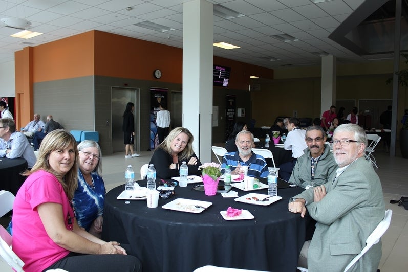 group of people eating at table