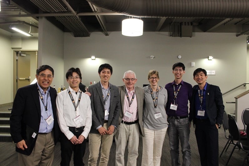 group smiling for photo