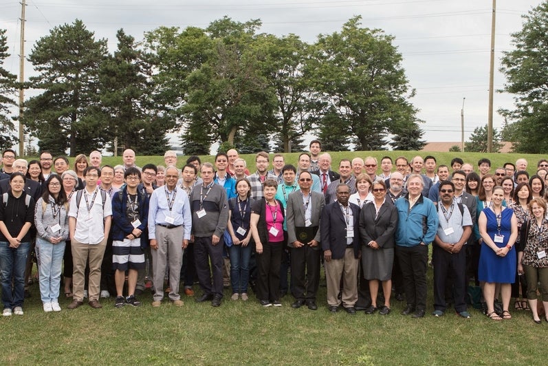 group photo of faculty on the grass