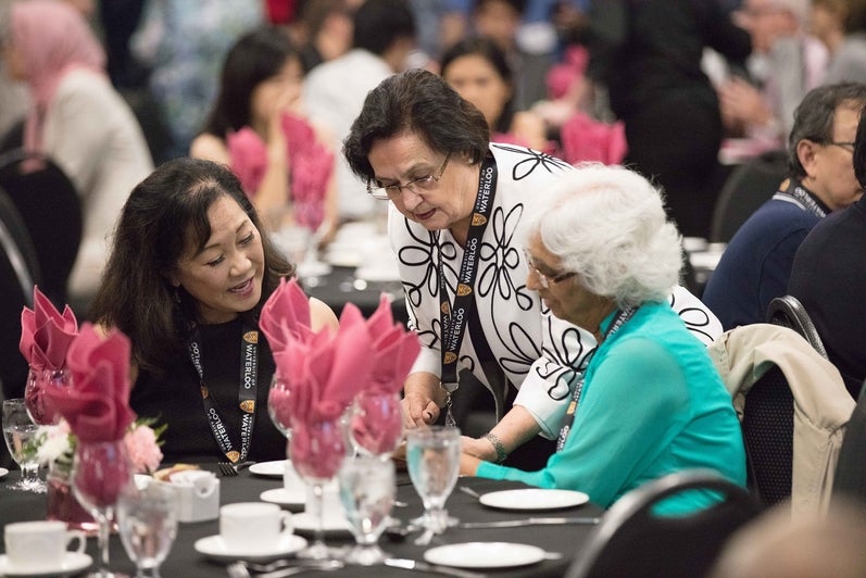 group of women talking at a table