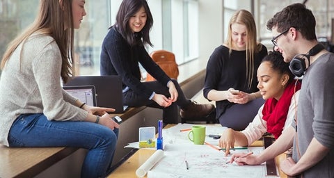 Research banner; students studying in a group