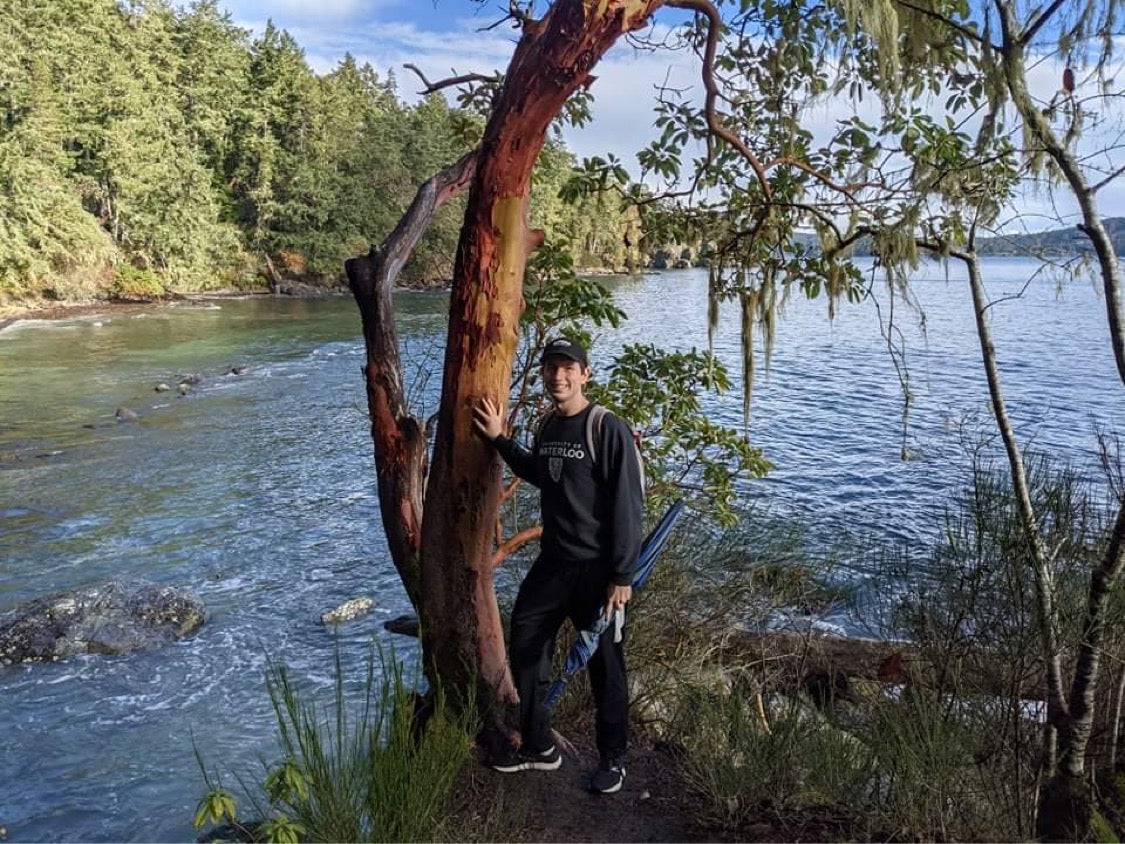 Cory with tree and river