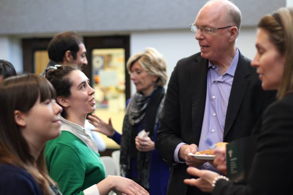 Jim Burpee chatting with students