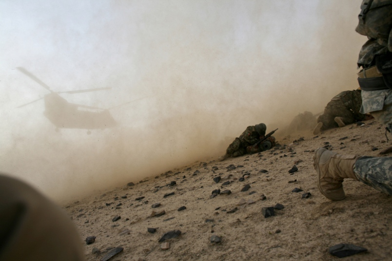 Plane flying through war torn Afghanistan