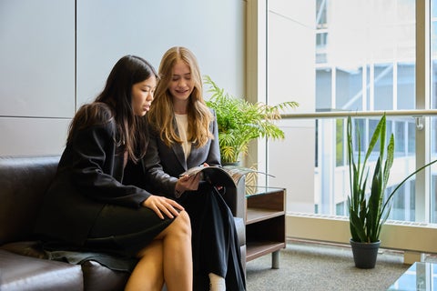Two women sitting talking