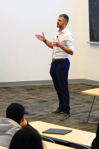 SAF professor Konrad Pawlak presenting at the career specialization event