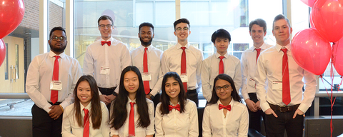 Picture of multiple students as SOAP ambassadors. Dressed in white shirts with orange ties.