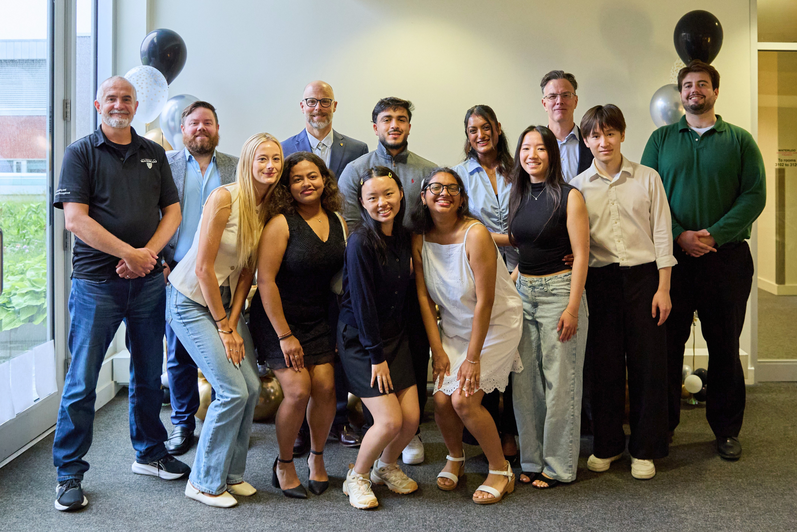 2026 SFM graduating class with program staff and faculty.