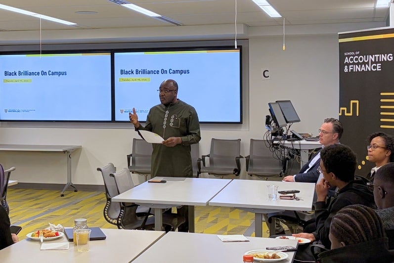 Alexie Tcheuyap, Dean of Arts addresses students at the Black Brilliance campus visit.