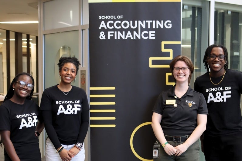 School of Accounting and Finance staff and volunteers.