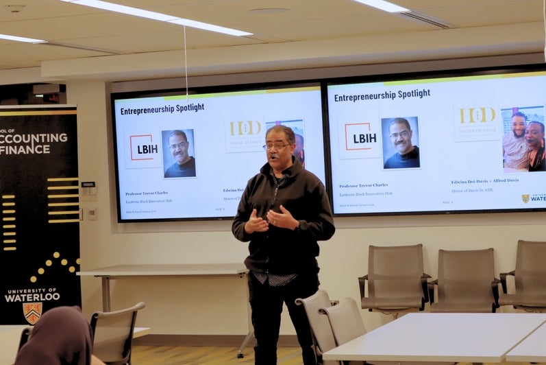 UWaterloo professor Trevor Charles presents to high school students at the Black Brilliance campus visit.