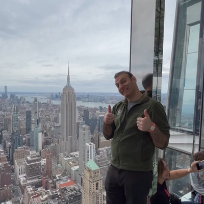 Professor Steve Balaban standing by the skyline of New York City