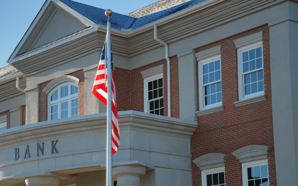 An American flag outside of a bank