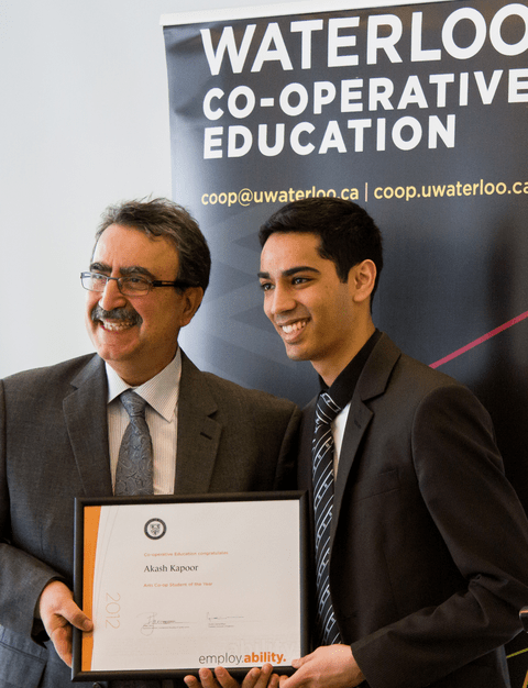 Akash Kapoor accepting the 2012 Co-op Student of the Year awarad from President Feridun Hamdullahpur