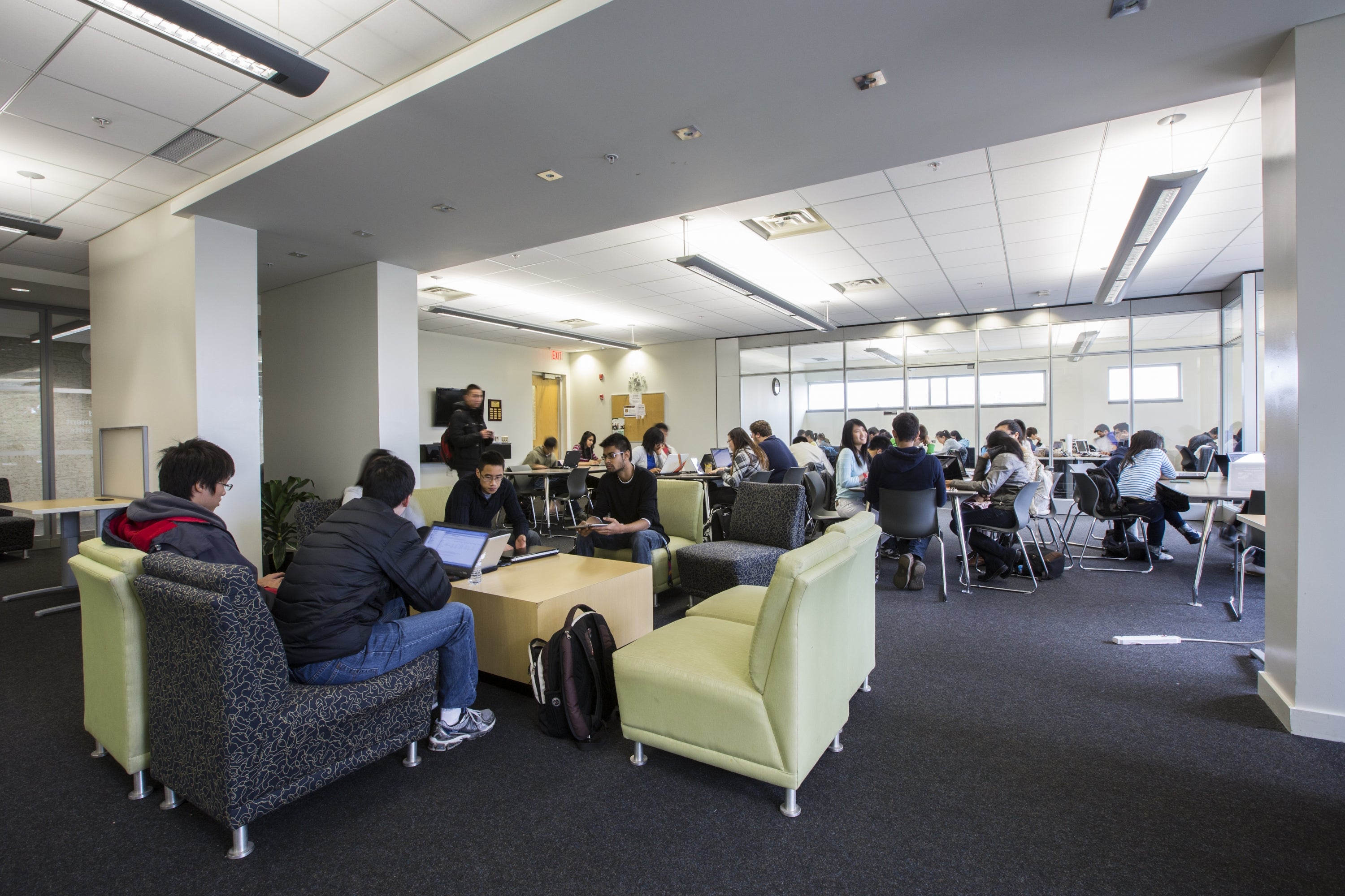 Open concept, the CPA Student Lounge is equipped with comfy chairs, tables, and quiety study areas.