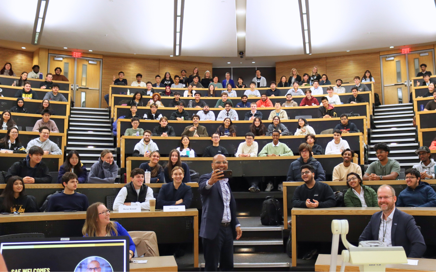 Benjie Thomas taking a selfie with crowd of students